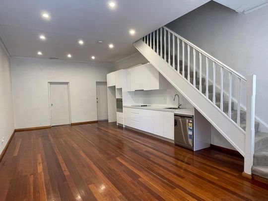 Three Bedroom Townhouse in Prime Location - Photo 1