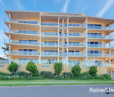 Furnished Spacious Coastal Apartment Living with Pool & Water Views - Photo 5