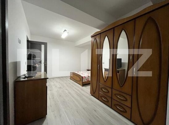 Apartament modern cu două camere, centrala si loc de parcare privat - Fotografie 1