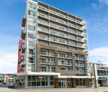 Peak Apartments - Photo 1