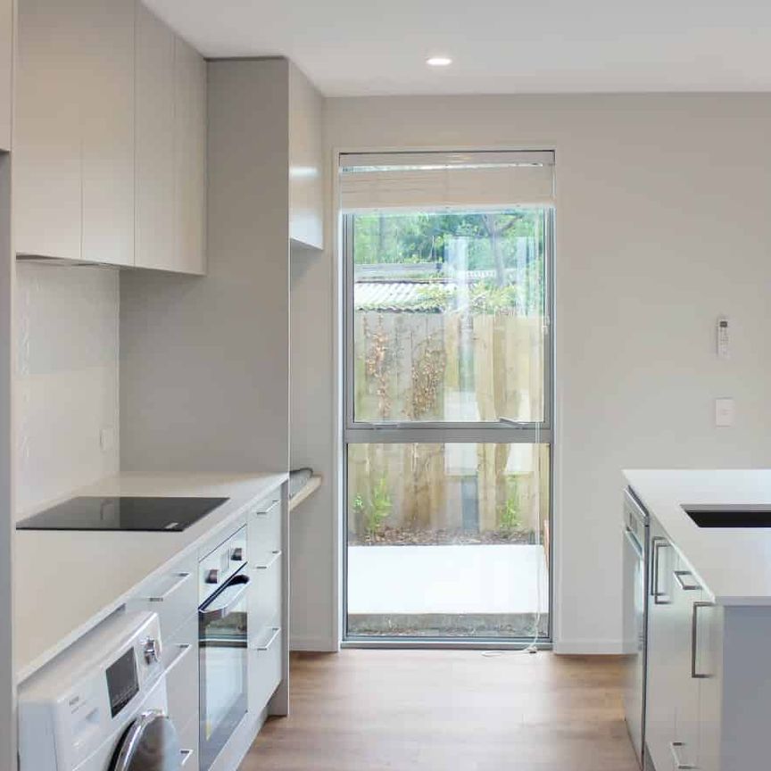 Near New Two Level Townhouse With Parking - Photo 1