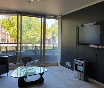 CONVENIENT, SPACIOUS & FURNISHED - Photo 2