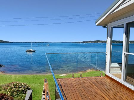 WATERFRONT LIVING - FULLY FURNISHED HOME AT BOLTON POINT - Photo 2