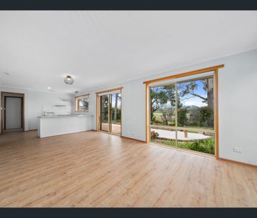 Cute and Comfortable Home in Tranquil Setting - Photo 1