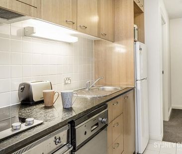 BOUTIQUE DESIGNER ABODE | Furnished - Photo 4