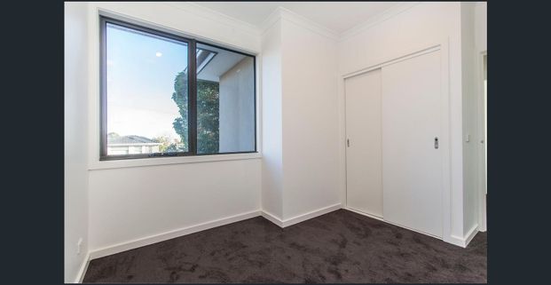 DOUBLE STOREY TOWNHOUSE WITH OWN STREET FRONTAGE - Photo 1