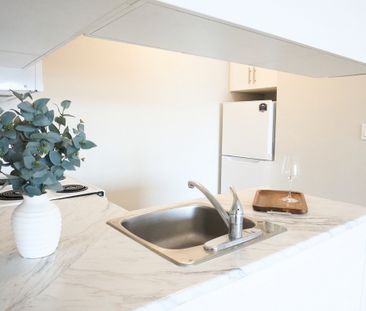 Park Towers Apartments - PARKING SPACE, HEAT & WATER INCLUDED - Photo 6