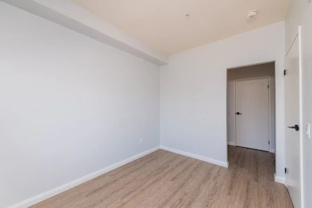 The Carmine — 1 Bedroom + Den - Photo 3
