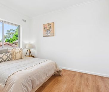 Charming Two-Storey Townhouse in a Peaceful Eastern Suburb Setting! - Photo 1