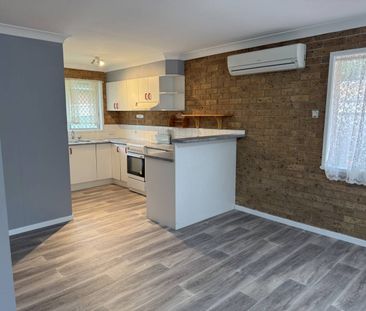 Perfectly Positioned 2-Bedroom Unit - Photo 1