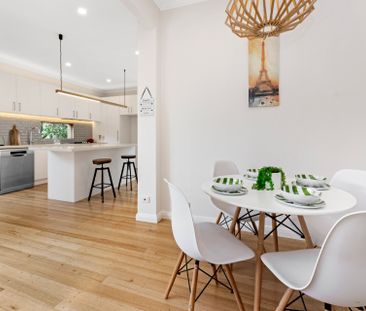 Family home located in the McKinnon School Zone! - Photo 1