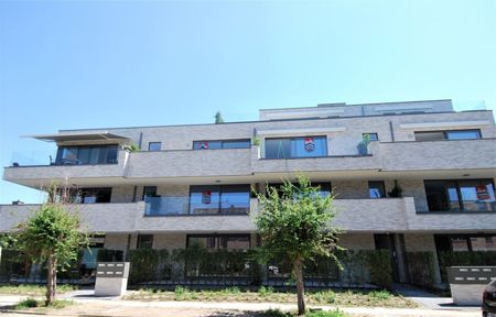 Nieuwbouwappartement met 2 slaapkamers, terras en autostaanplaats. - Photo 2