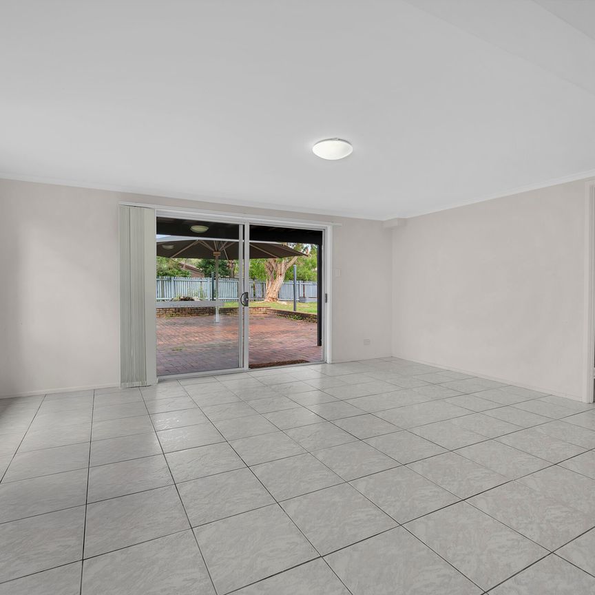 A charming home set on a generous block with a sprawling backyard. - Photo 1