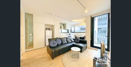 Stylish Fully Furnished 1-Bedroom with Balcony and Modern Amenities - Photo 2