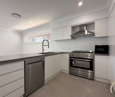 Brand New 4 Bedroom Home, Located in Austral! - Photo 2