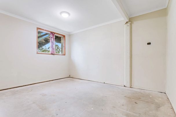 Perfect Family Living: Light-Filled Home with Fenced Yard - Photo 1