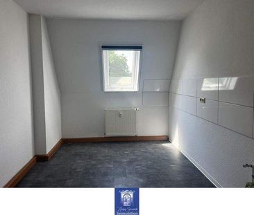 Individuelle Wohlfühlwohnung unterm Dach! Hofseitiger Balkon und to... - Foto 2