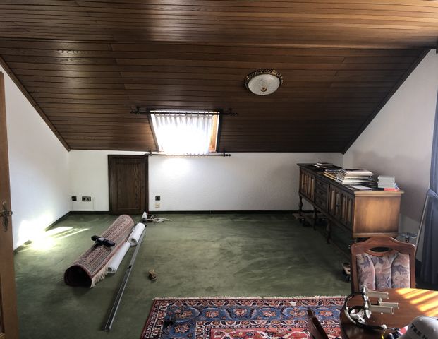 Gemütliche DG-Wohnung in Münzenberg-Gambach! - Photo 1
