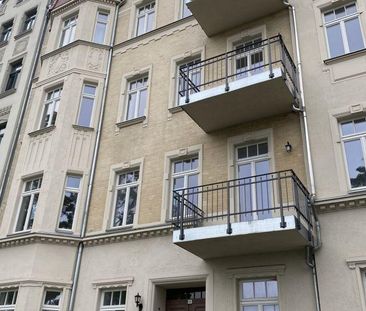 Erstbezug mit Balkon - Foto 1