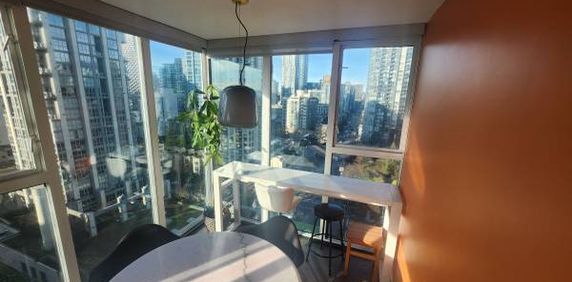 Furnished Corner Unit 1 Bed + Den 682sqf - Photo 2