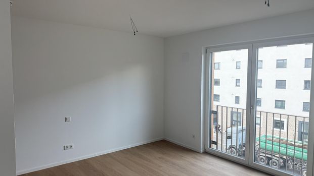 Neubau-Erstbezug! Stilvolle 1-Zimmer-Wohnung in zentraler Lage - Photo 1