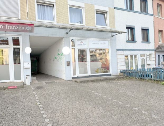 Helle Wohnung auf zwei Ebenen mit eigenem Keller und Außenstellplatz - Foto 1