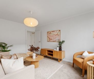 Sunlit Apartment Living Steps from Rathdowne Village Charm - Photo 4