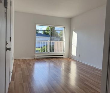 Un mois GRATUIT. Bel appart libre quartier calme, sécuritaire. Cent... - Photo 1