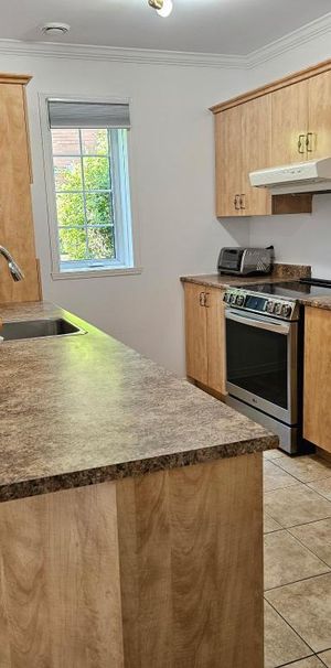 Beau condo locatif 2 chambres de qualité supérieure à Sainte-Julie - Photo 1