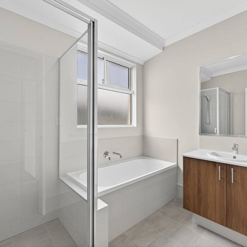 BRAND NEW FAMILY HOME WITH THEATRE ROOM - Photo 1