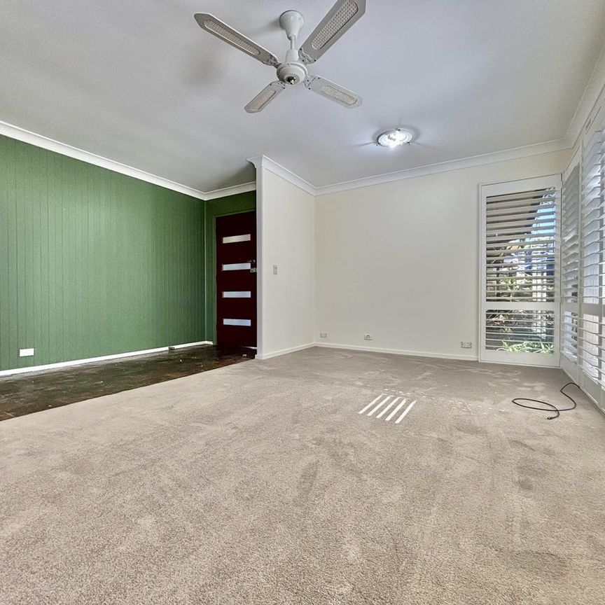 Freshly Updated Family Home with Large Backyard... - Photo 1