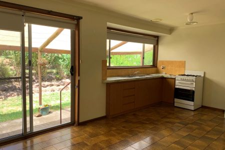 Charming and functional 3-bedroom brick home with garden views. - Photo 5