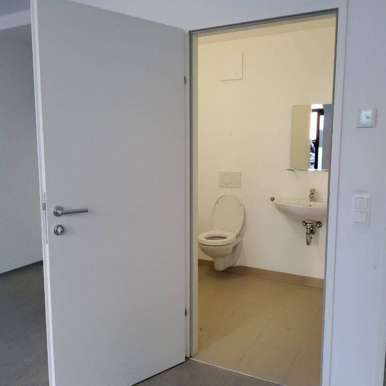 helle Geschäftsfläche im Erdgeschoss - Foto 1