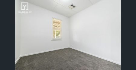 CENTRAL AND CHARMING - Photo 2