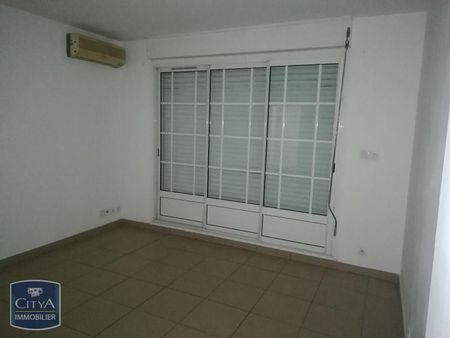 Location Appartement 2 pièces 43m² LA POSSESSION 97419 - Photo 2
