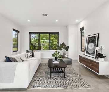 Live a life of luxury in this Comtemporary Townhouse - Photo 1