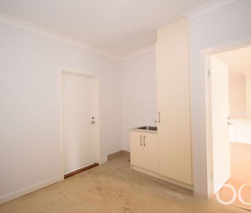 Open the Door To Stylish Easy-Care Living in Hillcrest - Photo 2