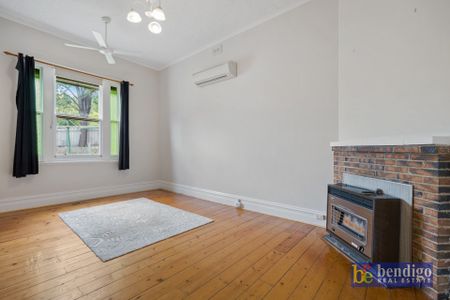 Charming Victorian Cottage Just Minutes from the CBD - Photo 3