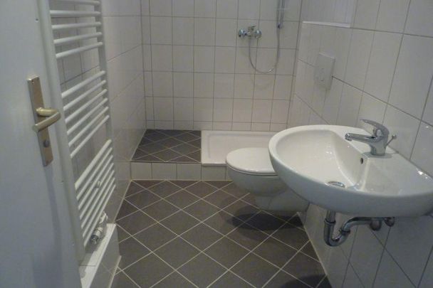 Drei-Zimmer-Wohnung mit Essplatz und neuem Duschbad - "Freie Scholle eG" - Photo 1