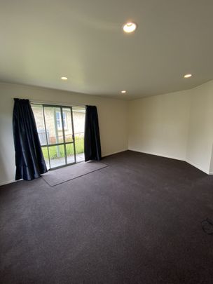 This tidy two-bedroom, one-bathroom home in Enderley offers comfortable living with an open-plan kitchen and lounge, and an internal laundry. - Photo 1