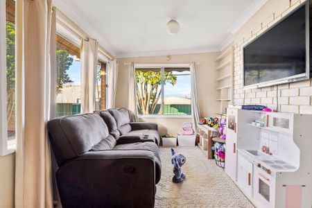 Spacious Three-Bedroom Home with Multiple Living Areas & Excellent Vehicle Access - Photo 2