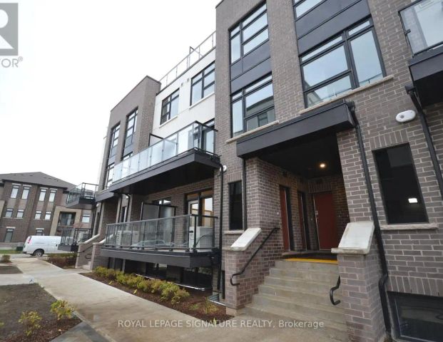 107 - 1573 ROSE WAY — 2 Bedroom - Photo 1