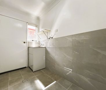 Stylish Renovated Home Offering Comfort, Space & Convenience - Photo 5