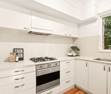Refined Courtyard Residence with Exceptional Village Convenience - Photo 4