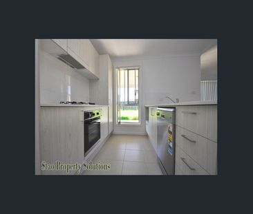 Renovated Brand New Hard Flooring! - Photo 6