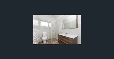 Cute Cottage Style Home in Sought After Location - Photo 4