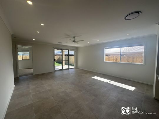 STUNNING FAMILY HOME IN THE NEW ESTATE IN YARRABILBA - AVAILABLE NOW - Photo 1