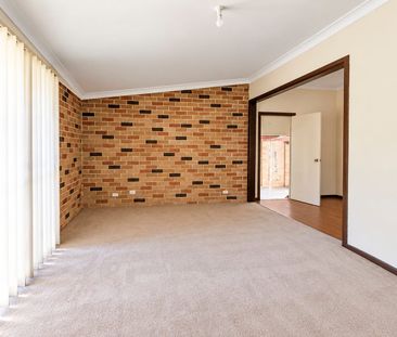 SPACIOUS DOUBLE BRICK HOME WITH OVERSIZED GARAGE - Photo 1