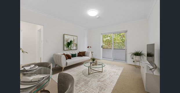 BRIGHT & SUNNY ONE BEDROOM APARTMENT WITH UNDERCOVER PARKING - Photo 1