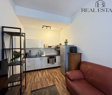 Gemütliche Erdgeschosswohnung mit Balkon - Foto 1